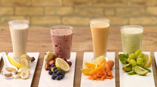 Banana, berry, orange and kiwi smoothies