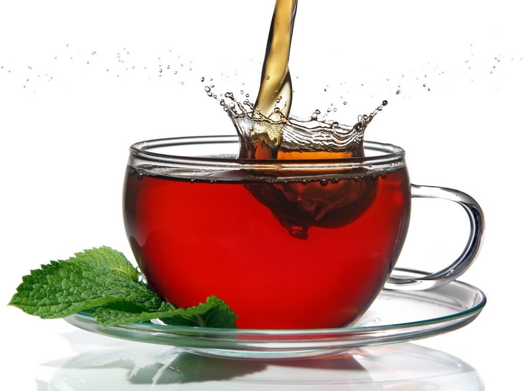 Red tea with mint leaves