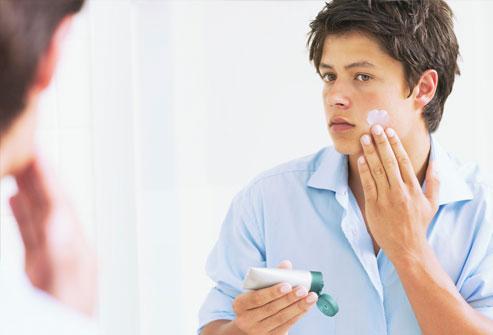 Woman washing her face