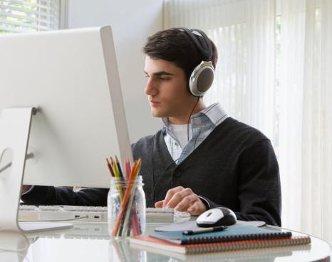 Man typing on a computer